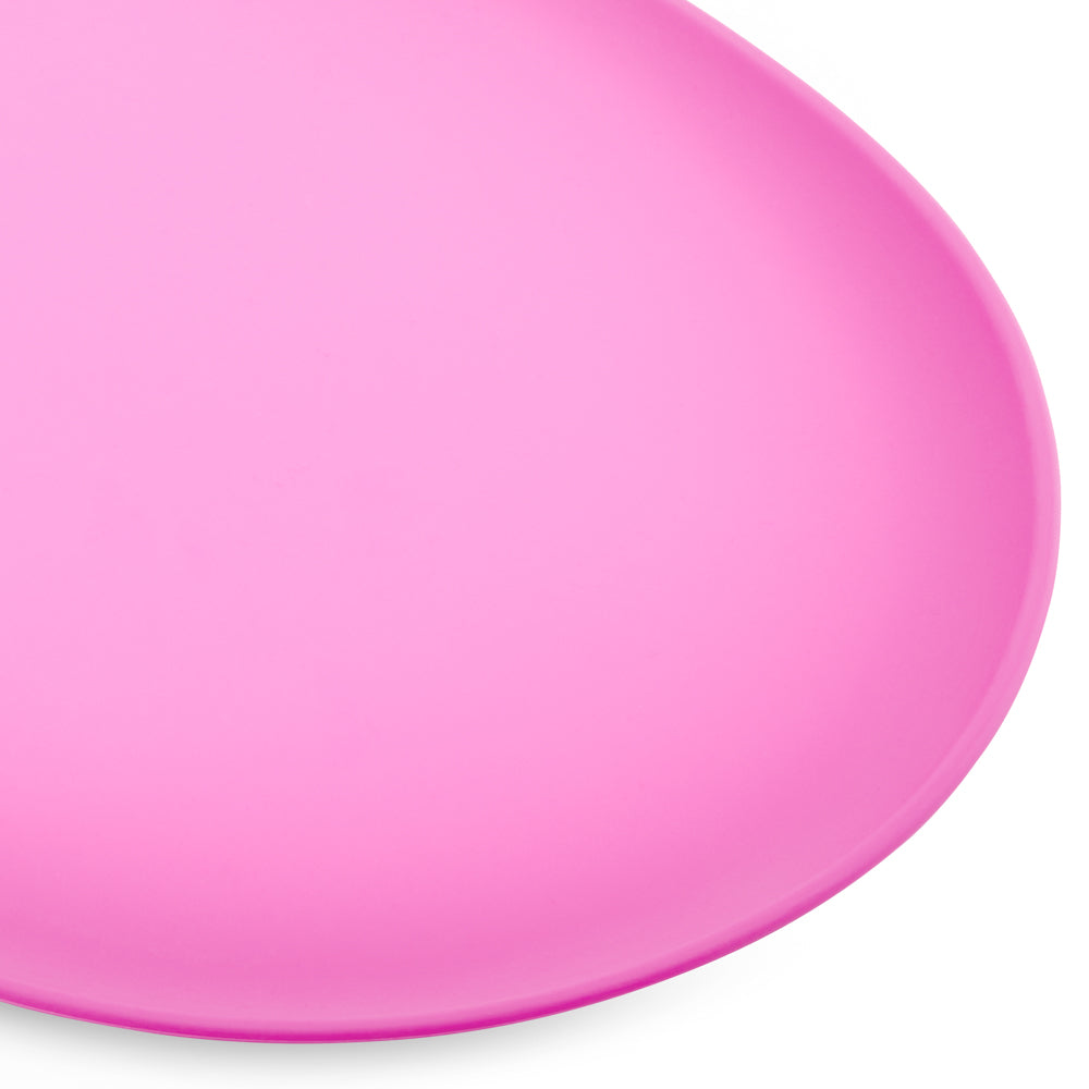 Close-up of BECO placemat in pink raised edges showing spill-catching design.