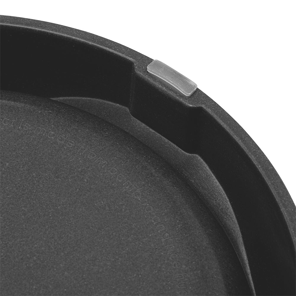 Close-up view of BECO bamboo cat bowl showing non-slip studs on base for stability