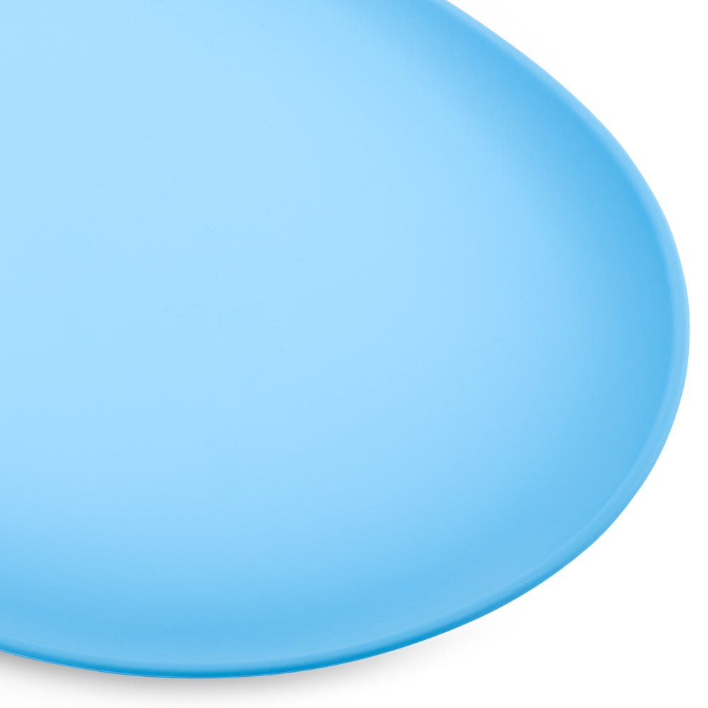 Close-up of BECO placemat in blue raised edges showing spill-catching design.