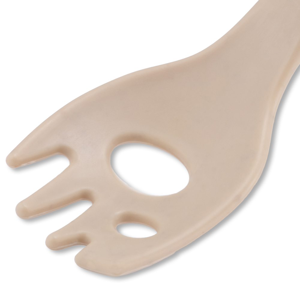 Close-up of BECO spork showing right-angled edge and central hole for mashing functionality